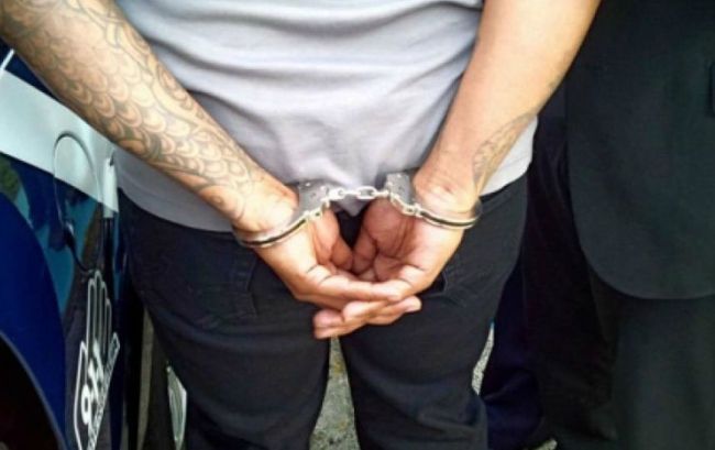 0_detenidos-esposado.jpg