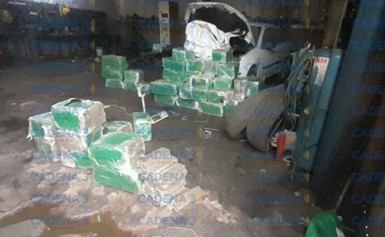 618_secuestran-m-s-de-550-kilos-de-marihuana-ocultos-en-un-taller-mec-nico-de-funes.jpg